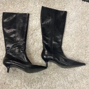 Ladies 9 West size 7 kitten heel tall boot with a pointed toe. Black leather